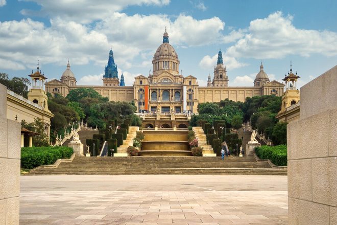 palau national barcelona spain gardens people front it cloudy sky